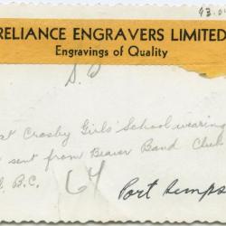 Girls at the Crosby Girls' School wearing aprons sent from Beaver Band Club of Trail, B.C.