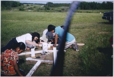 Painting the Crosses- Deidre Akapew, Nadine Akapew, Dakota Keewatin, Joseph Keewatin
