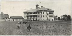 [Boys in the planting fields at Portage la Prairie Indian Boarding School]