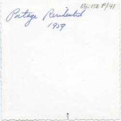 Portage Residential 1959 [Male student carving turkey].