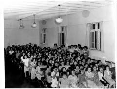 [Students in the assembly hall of the Alberni Indian Residential School]