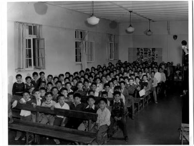 [Students in the assembly hall of the Alberni Indian Residential School]
