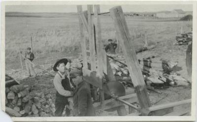 [Cutting wood, Red Deer Institute]