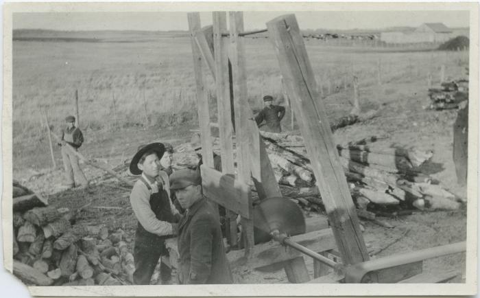 [Cutting wood, Red Deer Institute]