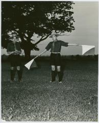 [Practicing flags at Cub Scouts]