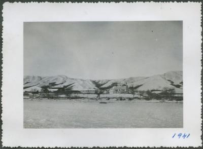 [View of the school from the lake]