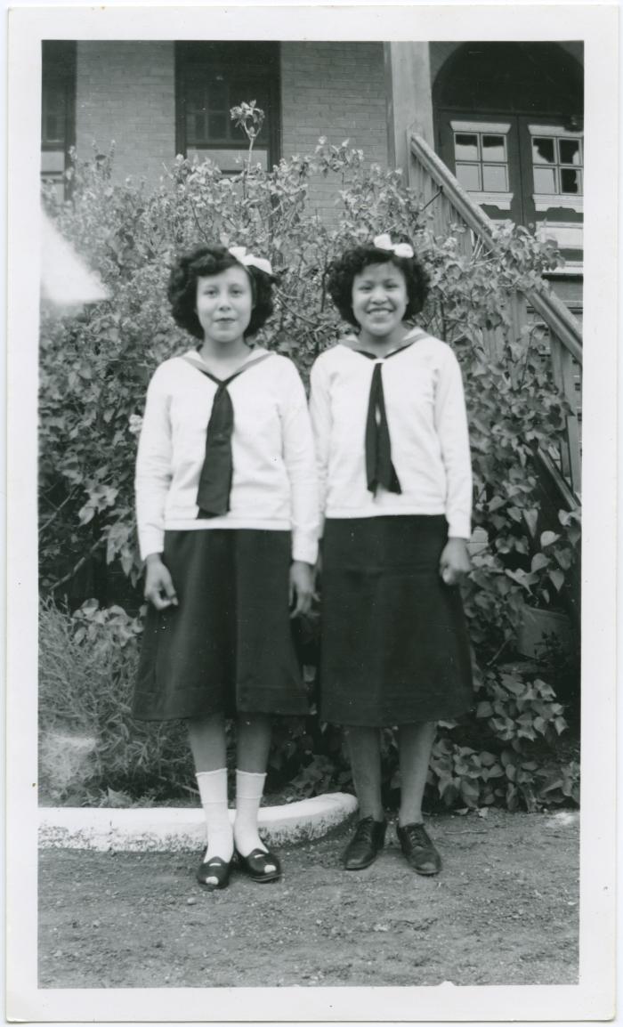 [Two Indian girls from the C.G.I.T. group, File Hills Residential School, Sask.]