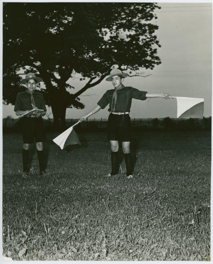 [Practicing flags at Cub Scouts]