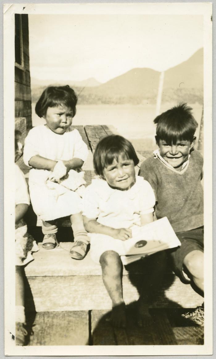 [Three children on wooden steps, Ahousaht, BC.]