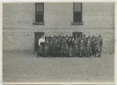 Boys with some of the staff at the Mount Elgin Indian Industrial Institute, Muncey
