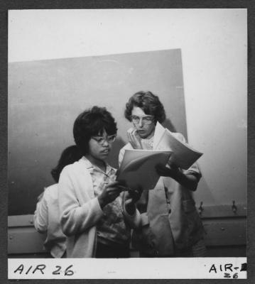 Alberni Indian Residence Alberni, B. C. Girl student with councillor [i.e. councilor]. Each grade level has its own councillor [i.e. councilor] who looks after general welfare.