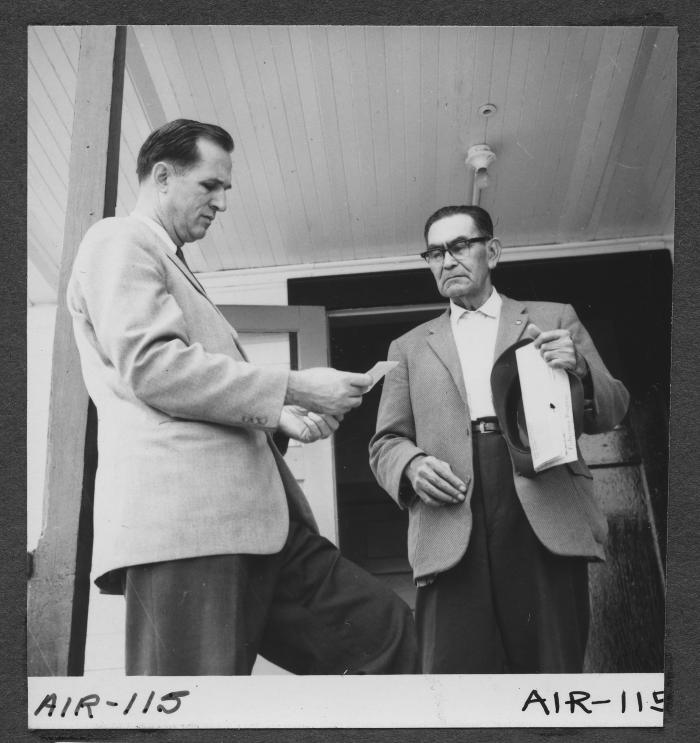 Alberni Indian Residence Alberni, B. C. Rev. Ed Kempling and Mr. Jack Peters on verandah of Friendship Centre.