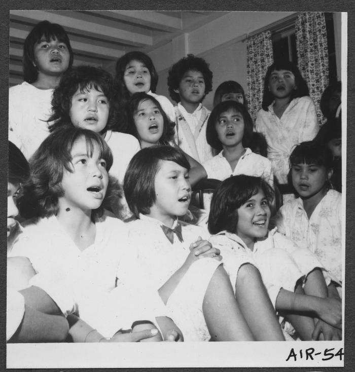 Alberni Indian Residence Alberni, B. C. Girls having sing-song before bedtime.