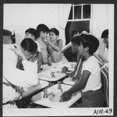 Alberni Indian Residence Alberni, B. C. Boys washing up for bed.