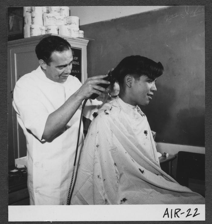 Alberni Indian Residence Alberni, B. C. Boy resident getting haircut.