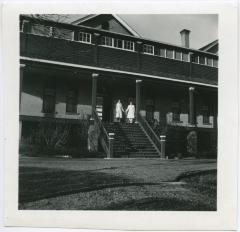 File Hills Residential School with Miss Staples and Miss Baird on the steps