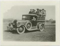 Our baseball team starting for Edmonton in the school truck to play city school team, Indian Residential School, Edmonton, Alta.