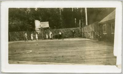 Plank playground and basketball court built by W.M.S. [Woman's Missionary Society]
