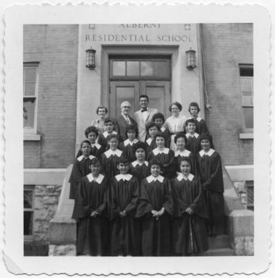 Mr. D. Robertson, Mr. A.E. Caldwell, staff, and part of the Alberni Indian School choir