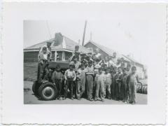 Mrs. Loveys and some of the boys with the new tractor, File Hills Residential School, Sask.