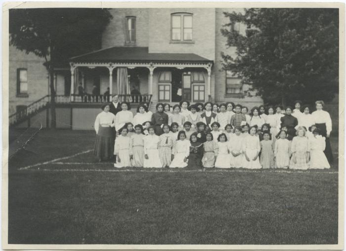 Staff and girls at the Mount Elgin Indian Industrial Institute, Muncey