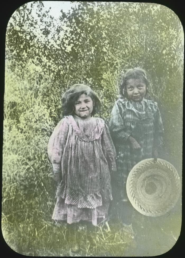 Two little girls at home on Cote's Reserve