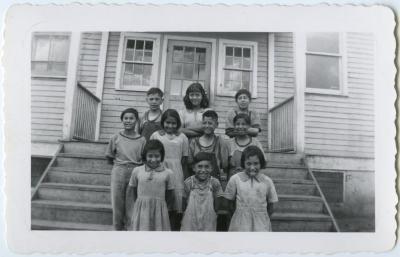 Some of the children on the steps of the school, Round Lake, Sask.