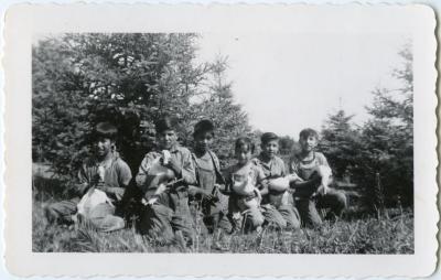 Some of the beginners and grade ones with the ducks : Mr. Bell got the duck eggs and taught the children to take care of them