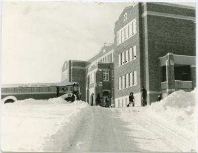 The school in winter. Brandon schoolbus