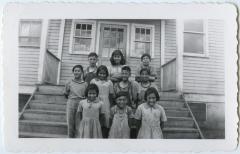 Some of the children on the steps of the school, Round Lake, Sask.