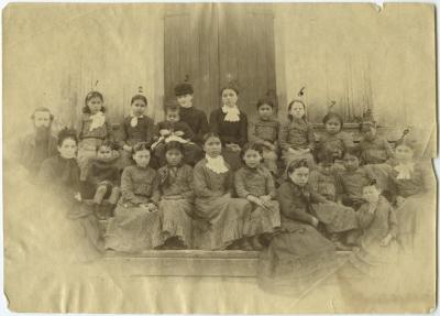 Rev. Thomas and Emma Crosby with Miss Susanna Lawrence and Indian school girls, Port Simpson, B.C.