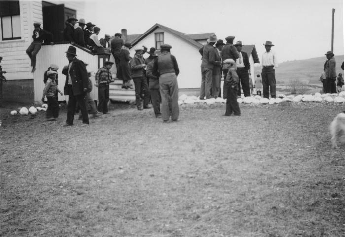 Parents and children visiting after church, Morley