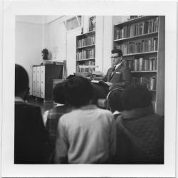 Story hour, Alberni Indian Residential School : Keith Johnson, vice-principal reading to a class