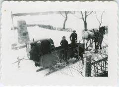 Two lady staff members going into Balcarres by sleigh