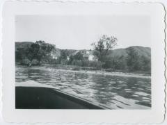 The residence and the school from the Lake with the Qu'Appelle hills in the background