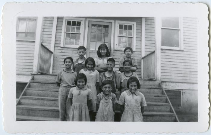 Some of the children on the steps of the school, Round Lake, Sask.