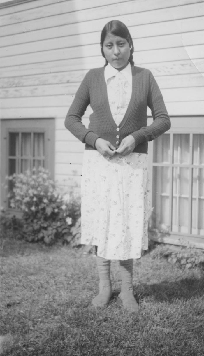 Lily Wildman outside minister's house