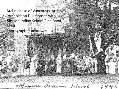 [Archbishop Duke poses with Mission Indian School Pipe Band]