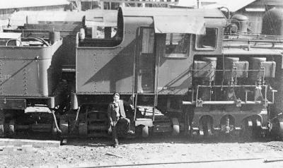One of our St. Michael's boys at a lumber camp railway