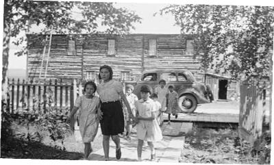 Some of the children from St. Paul's Hostel going into church at Dawson, Yukon