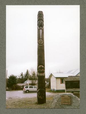 Totem with story of Indian Residential Schools