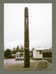 Totem with story of Indian Residential Schools