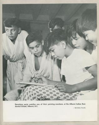 Dormitory party watches one of their painting members, at the Alberni Indian Residential School, Alberni, B.C.