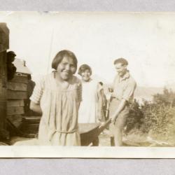 Mr. Bailey and two of the girls helping to bring coals from the beach