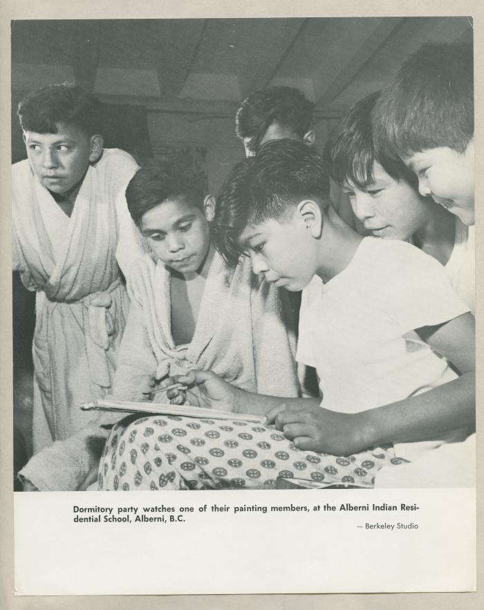 Dormitory party watches one of their painting members, at the Alberni Indian Residential School, Alberni, B.C.