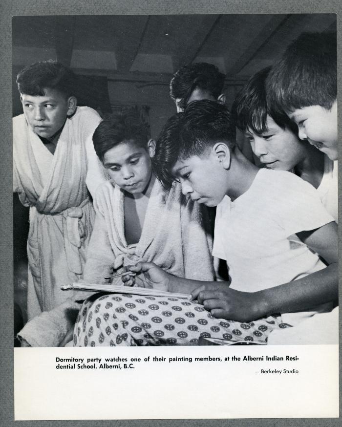 Dormitory party watches one of their painting members at the Alberni Indian Residential School, Alberni, B.C.
