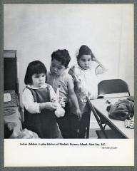 Indian children in play kitchen of Nimkish Nursery School, Alert Bay, B.C.
