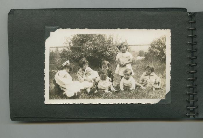 Children holding infants