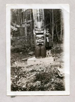 [Young woman and Totem Pole]