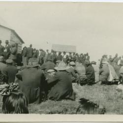 The quarterly council of the Cree Indians when they receive their treaty money from the government : the government agent is to be seen seated at the table, Norway House, Man.